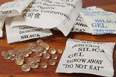Macro of silica gel bags on a table