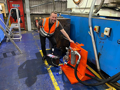 Clean machines…OMS Lubritek Director Jamie Shaw uses a PAMAS unit to check hydraulic oil cleanliness coming off the filtration board.