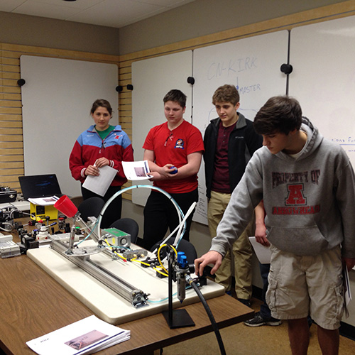 Students from Arrowhead High School worked together to assemble a fluid power classroom kit during the SCC program at Price Engineering.